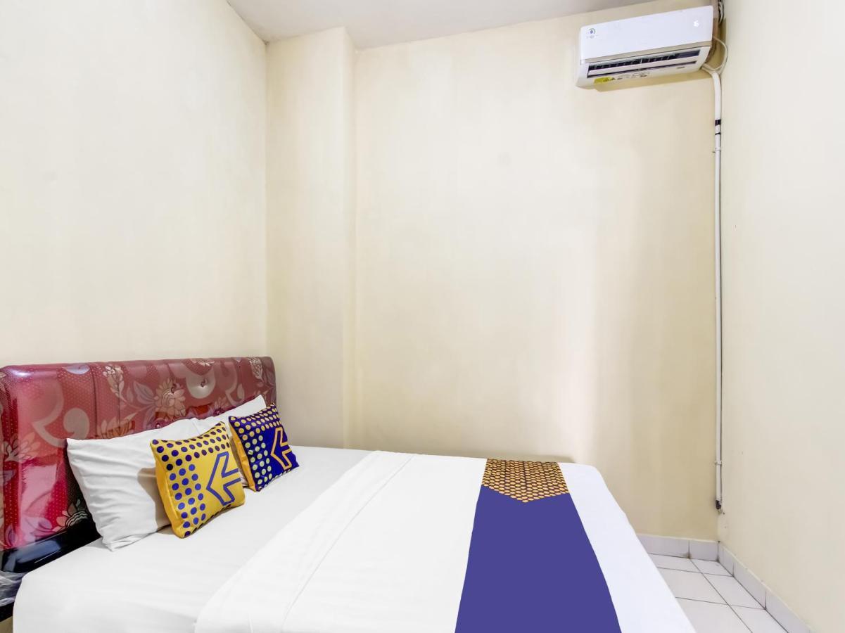 Oyo Life 91374 Asia Stay Semarang Syariah Buitenkant foto
