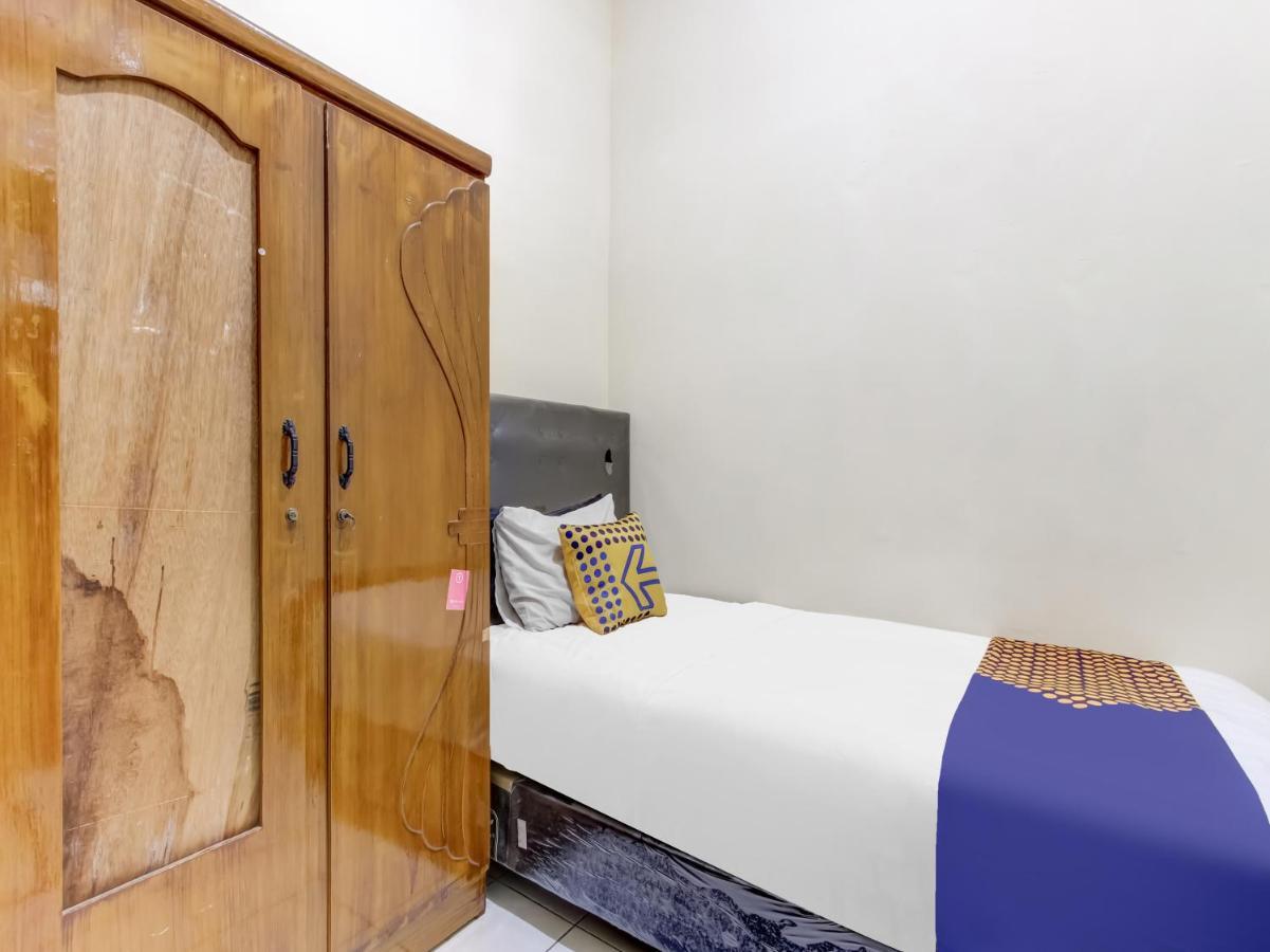 Oyo Life 91374 Asia Stay Semarang Syariah Buitenkant foto